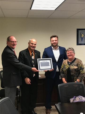 Marc LeBlond presented ACSIPA leaders with a plaque honoring faithful advocacy